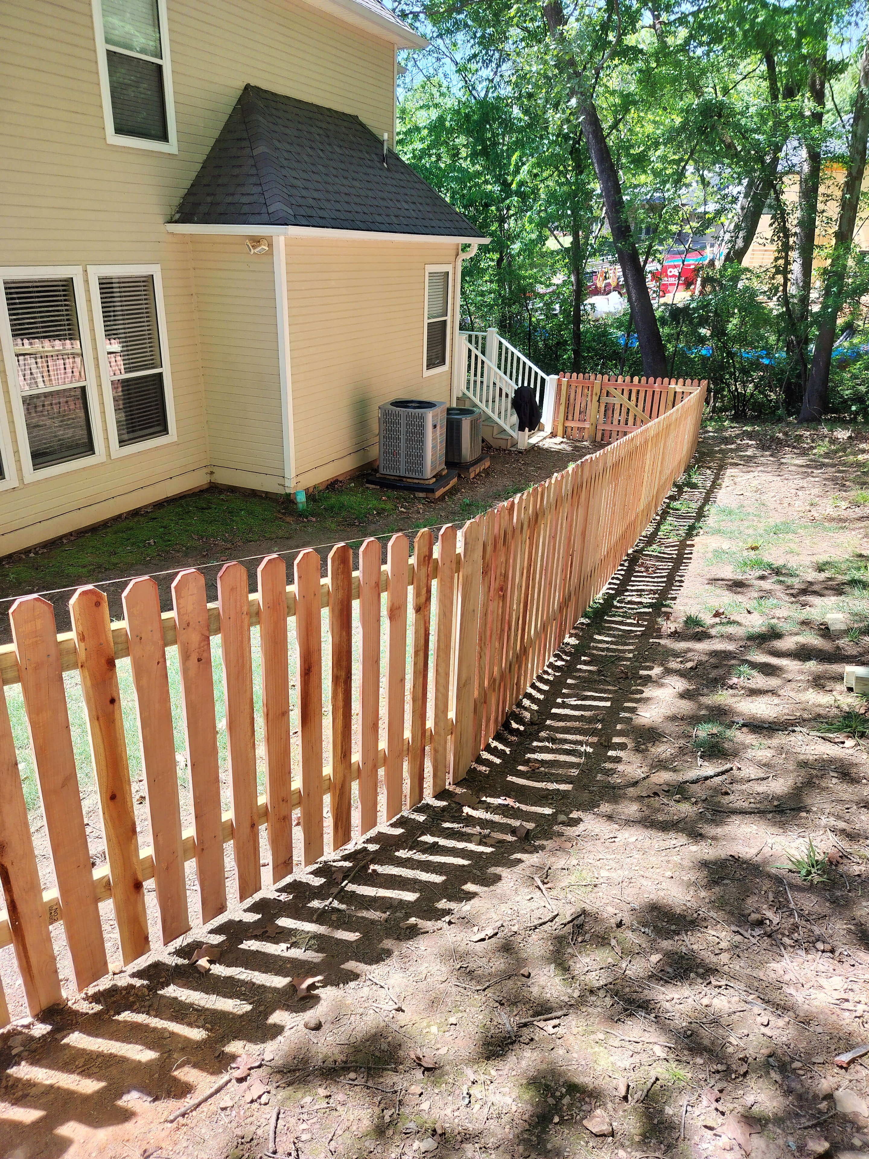Decorative white picket fence garden